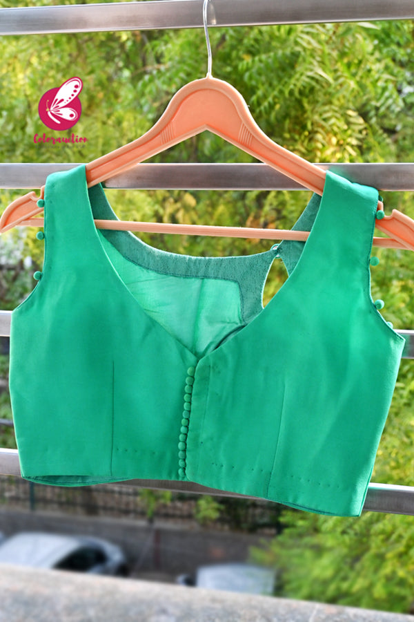 Green Padded Potli Buttons Sleeveless Crepe Blouse