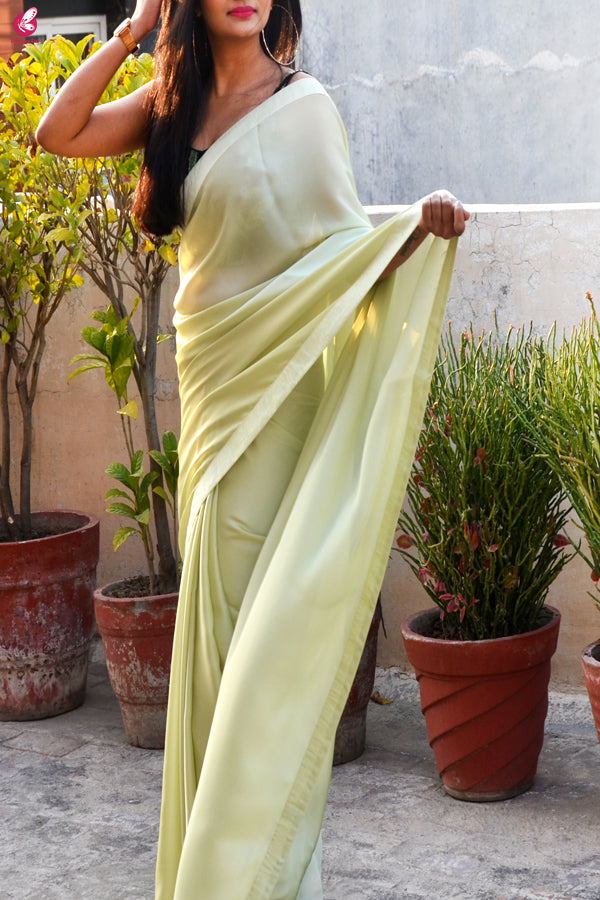 Pastel Lime Green Silk Georgette Dupion Silk Taping Saree