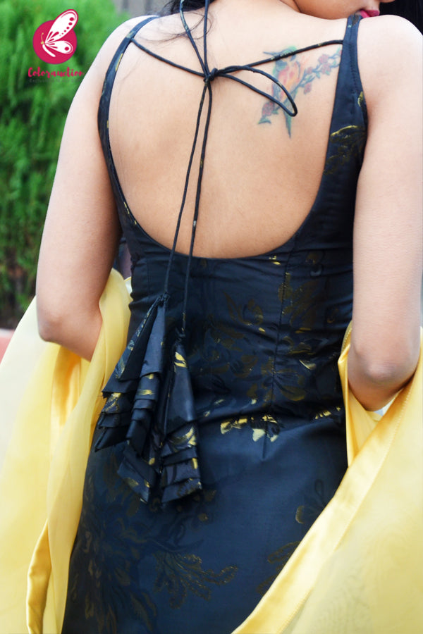 Black Golden Brocade Padded Knee Length Side Slit Kurti with Golden Organza Sharara Paired with Golden Organza Three-Tier Ruffle Stole