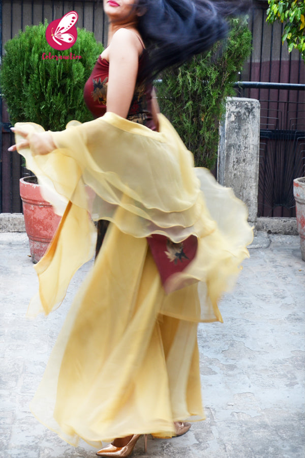 Rust Maroon Brocade Padded Kurta with Golden Organza Sharara and Golden Organza Three-Tier Ruffle Stole