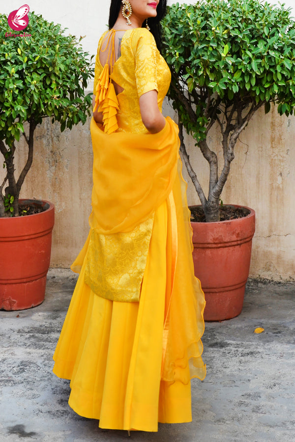 Yellow Brocade Padded Kurta with Yellow Crepe Skirt and Yellow Pure Organza Ruffle Dupatta